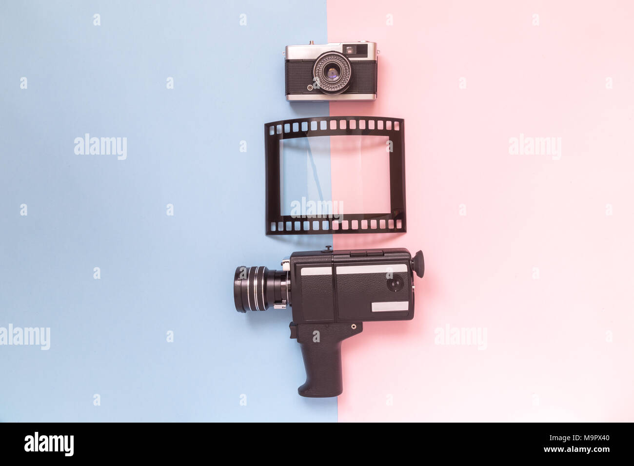 Retro vintage analog film camcorder, photo camera and picture frame on