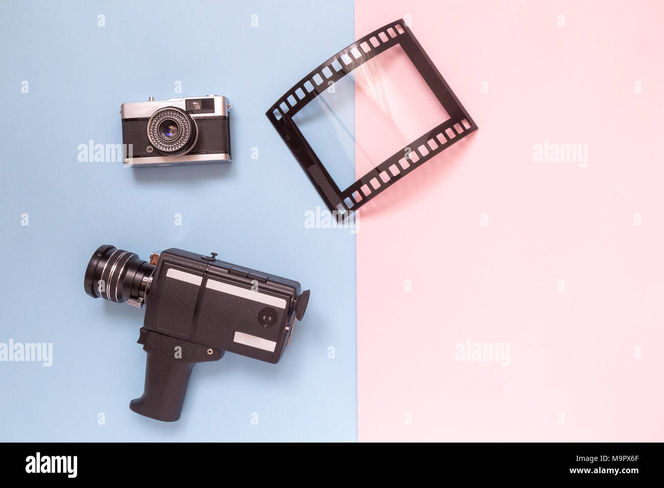 Retro vintage analog film camcorder, photo camera and picture frame on ...