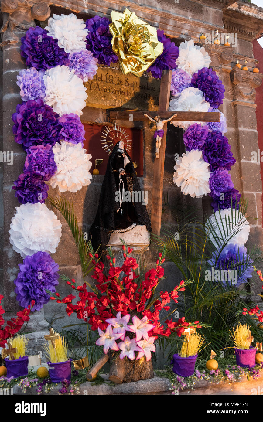 A community altar celebrating El Viernes de Dolores during Holy Week at the Aldama fountain March 23, 2018 in San Miguel de Allende, Mexico. The event honors the sorrow of the Virgin Mary for the death of her son and is an annual tradition in central Mexico. Stock Photo