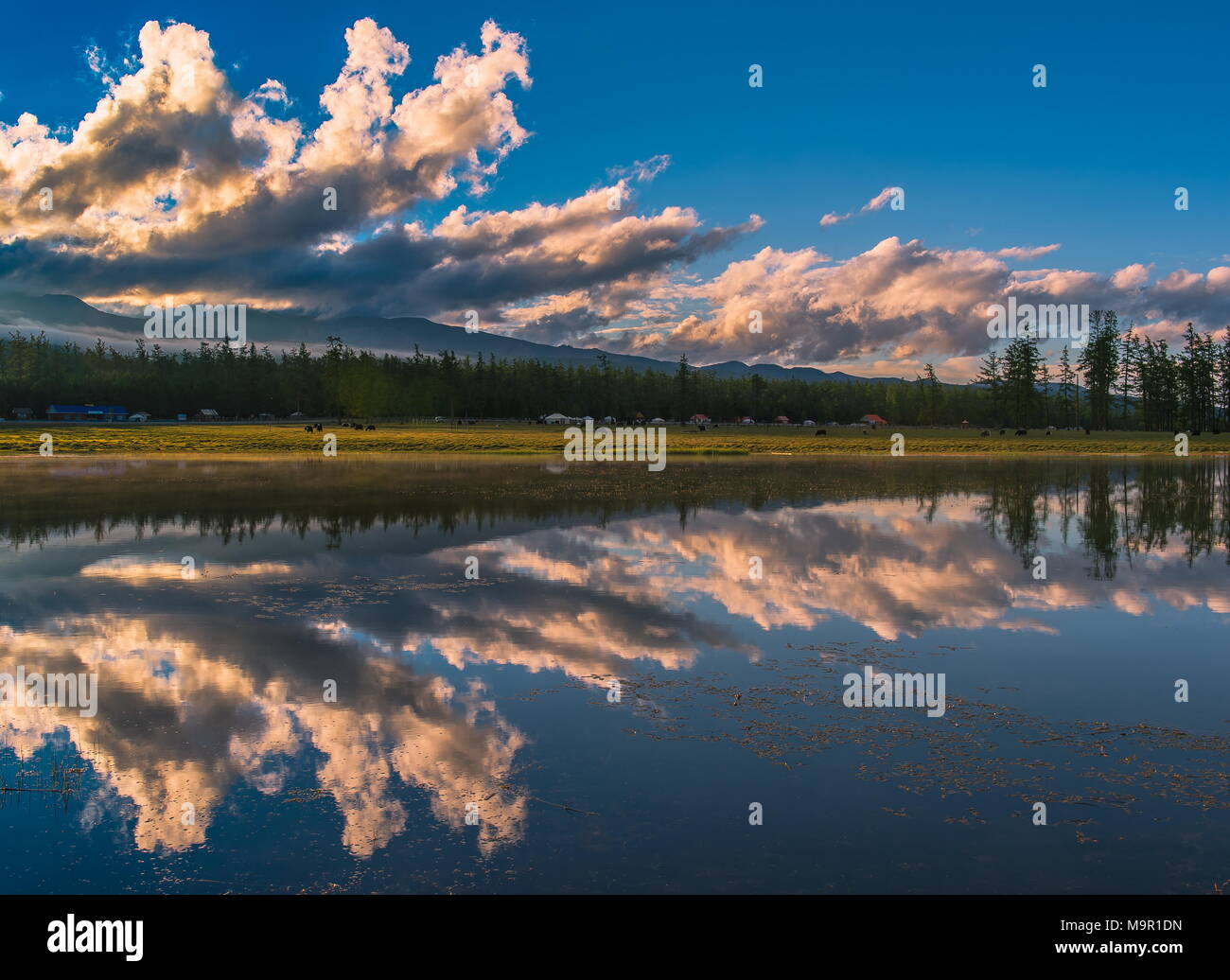 Khuvsgul Lake with dramatic clouds and water reflections, Mongolia Stock Photo