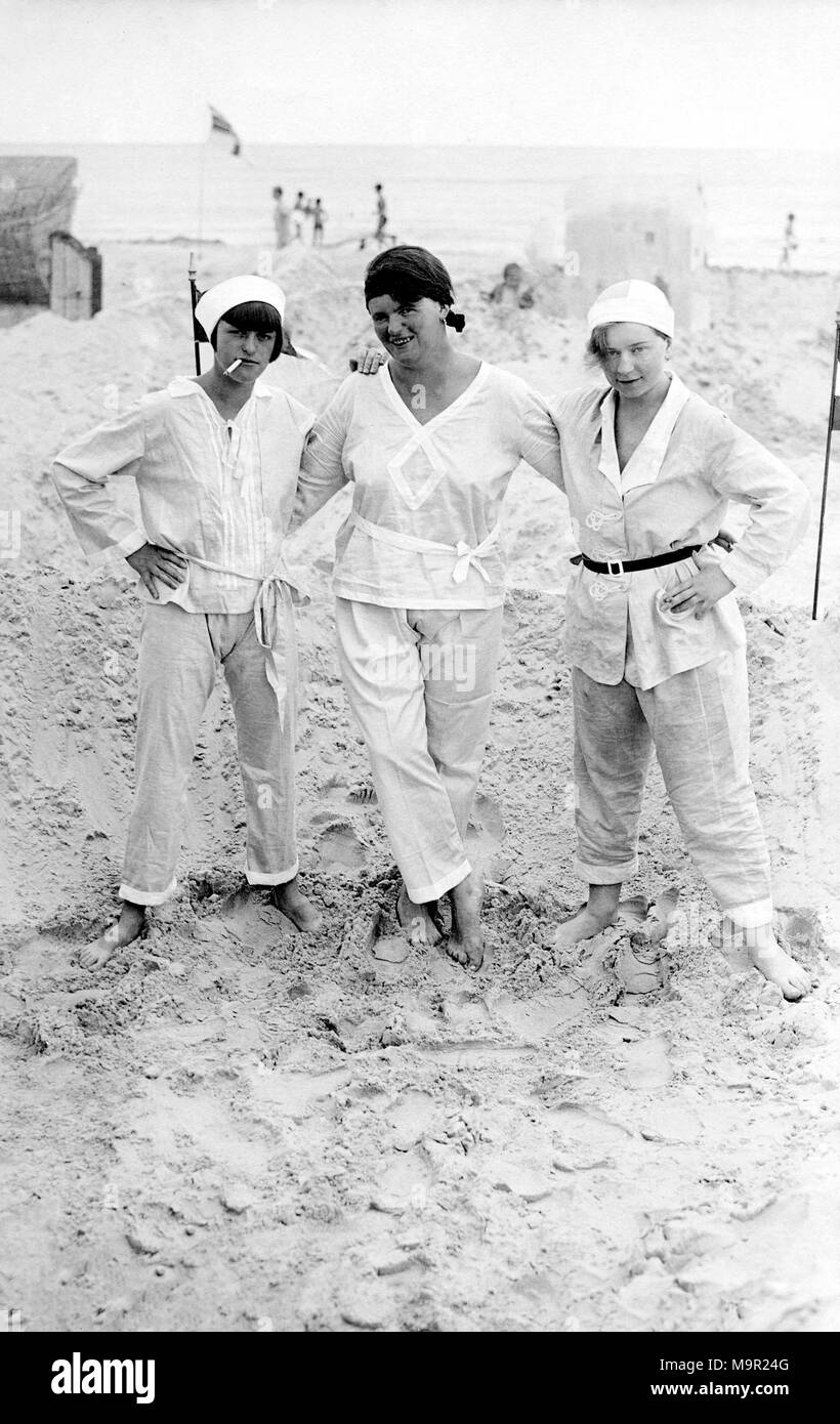 Three Women in Summer Suit on the Beach, 1920s, Germany Stock Photo
