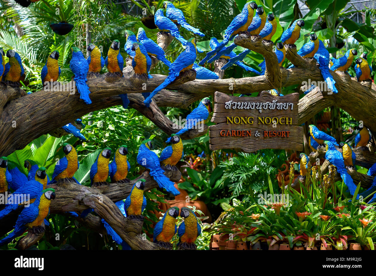 Parrot figures, Nong Nooch Tropical Botanical Garden, Pattaya, Thailand Stock Photo