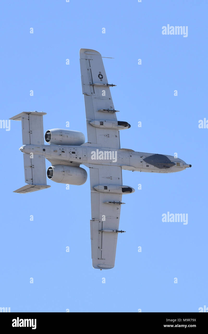 The F-35 Heritage Flight demonstration team pays tribute to the past present and future of Air Force aviation customs and capabilities during Luke Days, Luke Air Force Base, Ariz., March 17, 2018. Luke Days demonstrates the Air Force’s continuing progress in building the future of airpower with military and civilian air acts including the U.S. Navy Blue Angels, F-35 and F-22 static displays, science, technology, engineering, and math exhibits, and military operations demonstrations. (U.S. Air Force photo/SSgt Chris Moore) Stock Photo