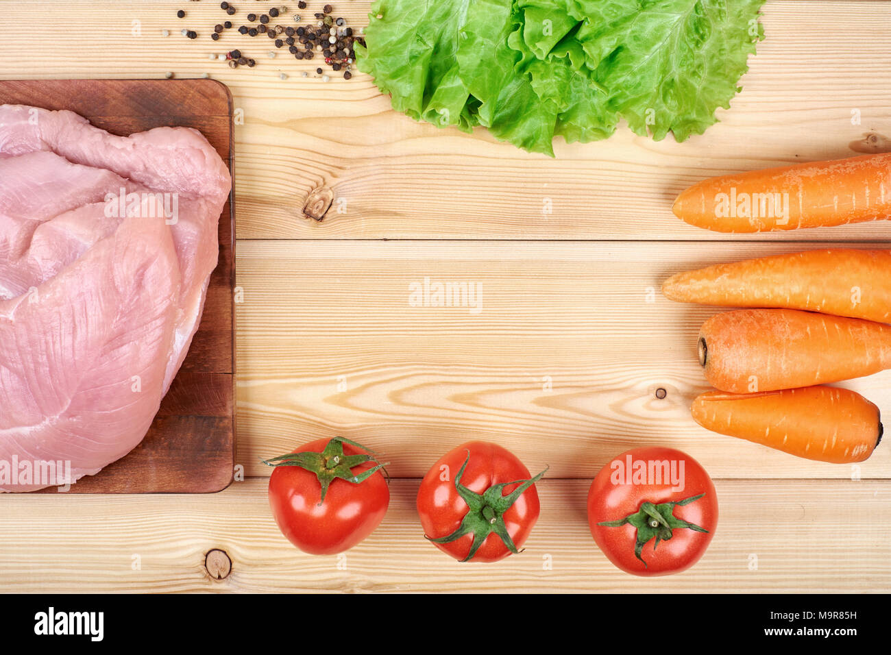 Download Frame Of Fresh Vegetables And Dietary Meat On Wooden Background Healthy Natural Food On Table With Copy Space Cooking Ingredients Top View Mockup For Recipe Or Menu Stock Photo Alamy