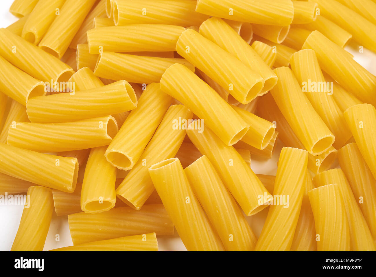 Rigatoni italian pasta isolated on white background Stock Photo