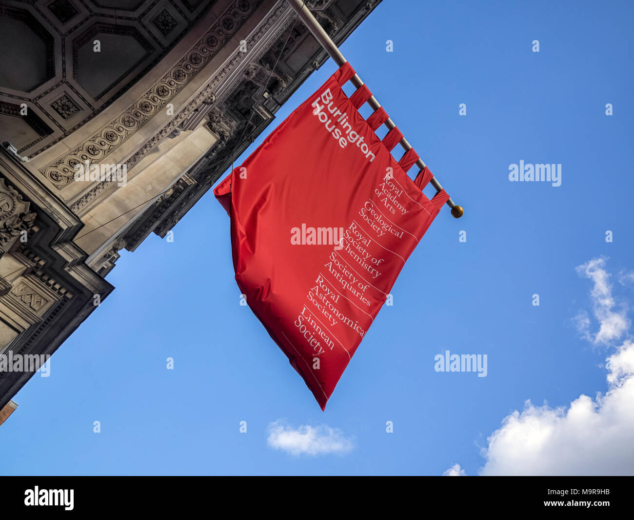 LONDON, UK - MARCH 08, 2018:  Banner sign outside former Mansion building which now houses a number of societies including the Royal Academy of Arts Stock Photo
