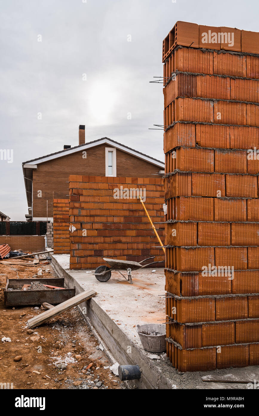 Works of construction of thermal clay block walls in construction site