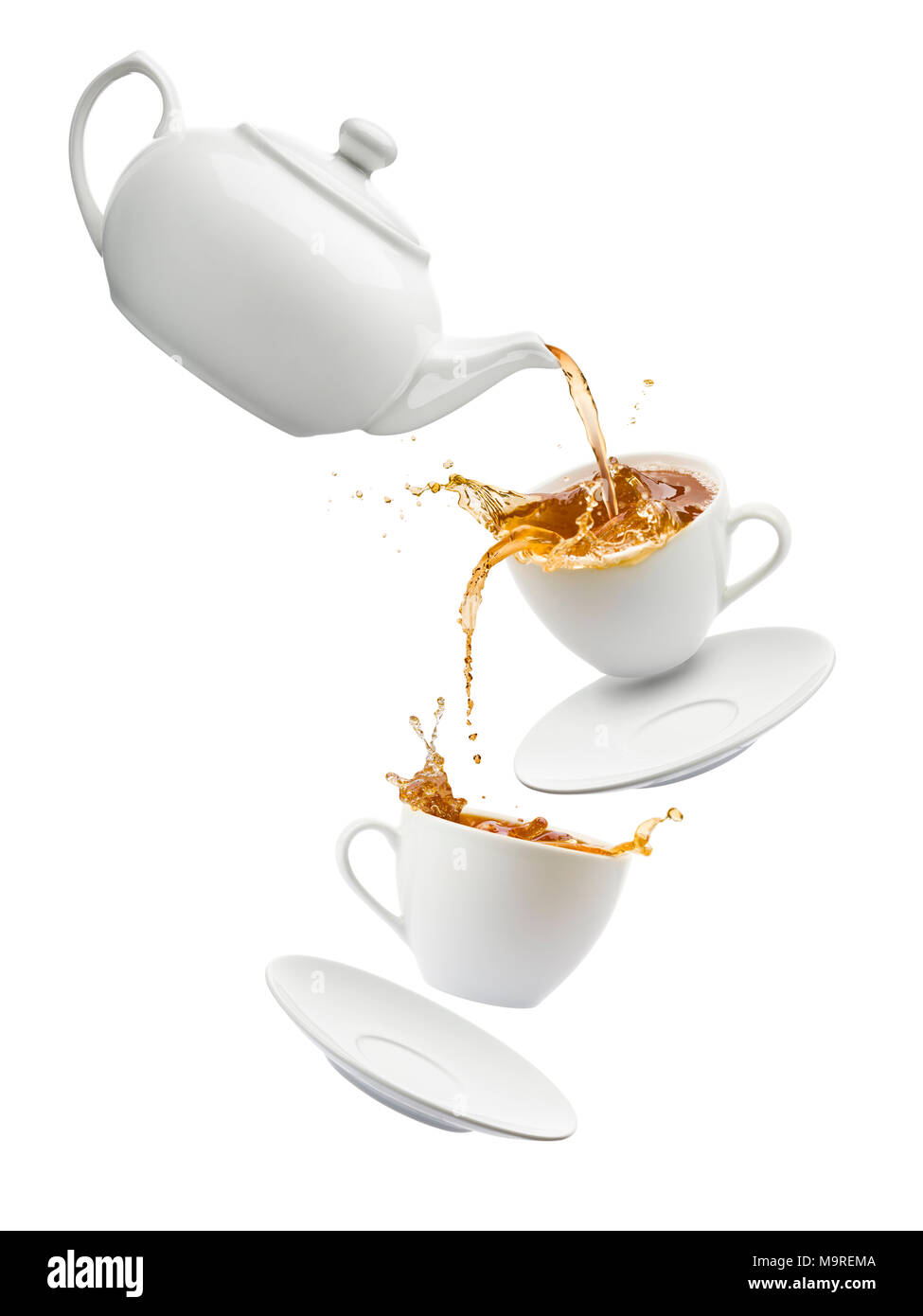 teapot pouring tea into flying cups, on white background Stock Photo - Alamy