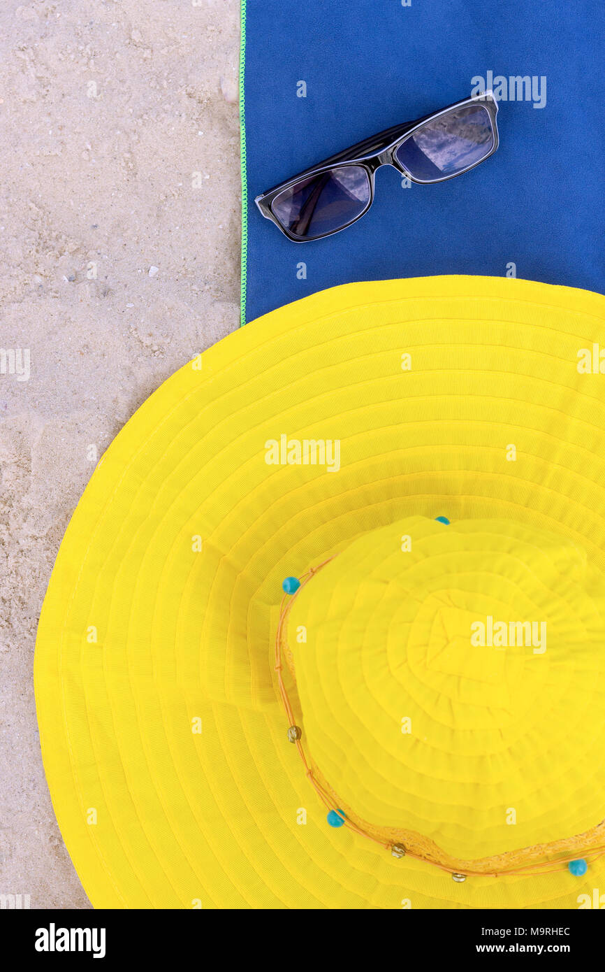 summer composition with hat and sunglasses on a sand beach Stock Photo ...
