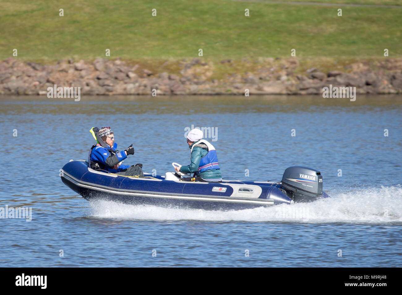 Power boat lesson, Trimpley Reservoir, Worcestershire, UK. Female pupil ...