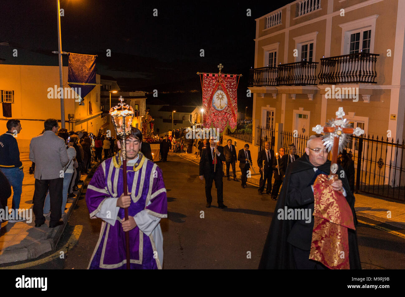 Religious procession in Holy week, through the streets of the old town in Adeje, with lifesize statues of Jesus and the Virgin mary, accompanied by ma Stock Photo