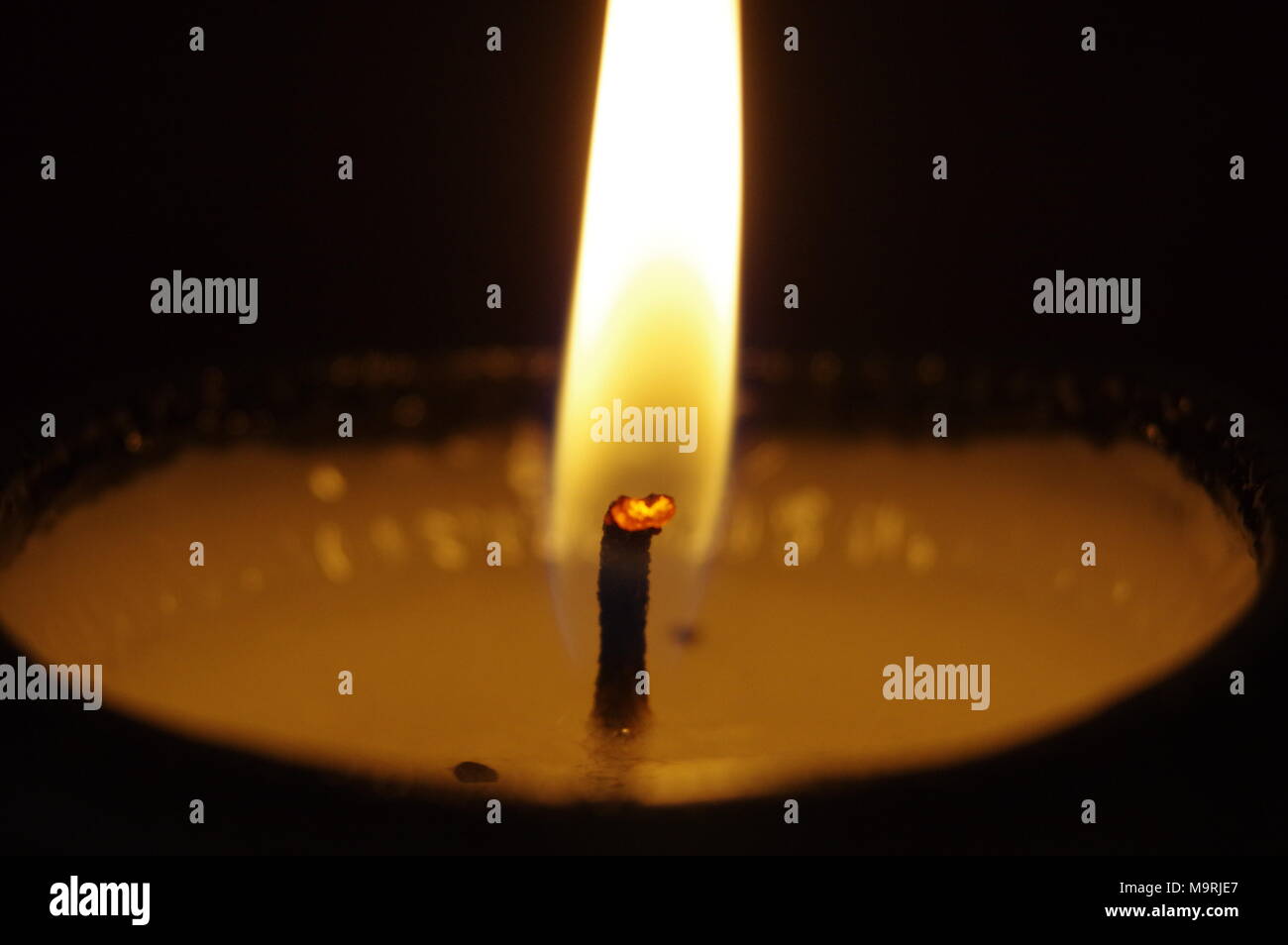 Candle light in the dark Stock Photo Alamy
