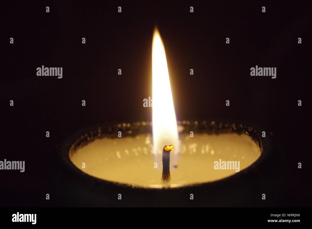 Candle light in the dark Stock Photo Alamy