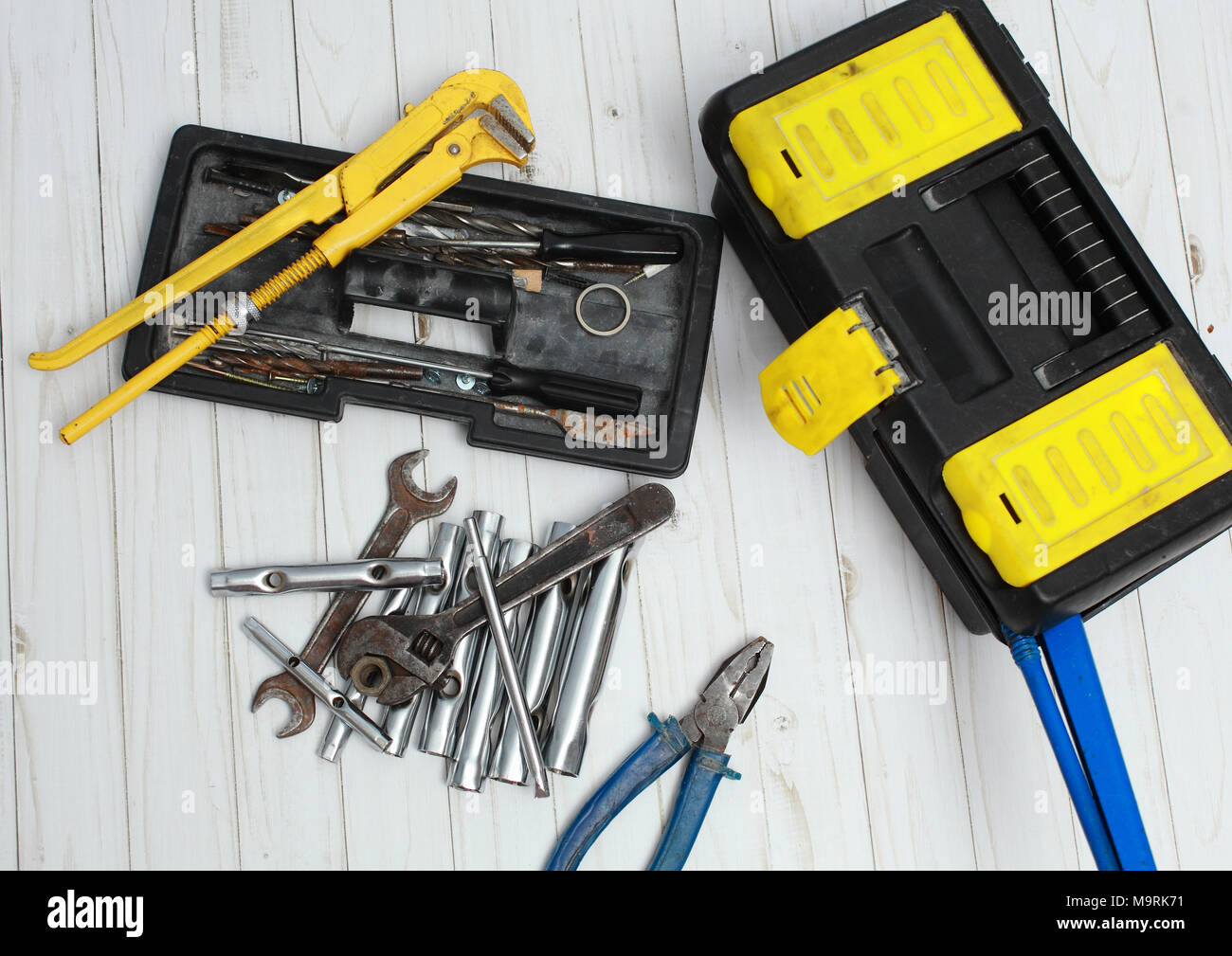 Tool box and different tools on the table. Stock Photo