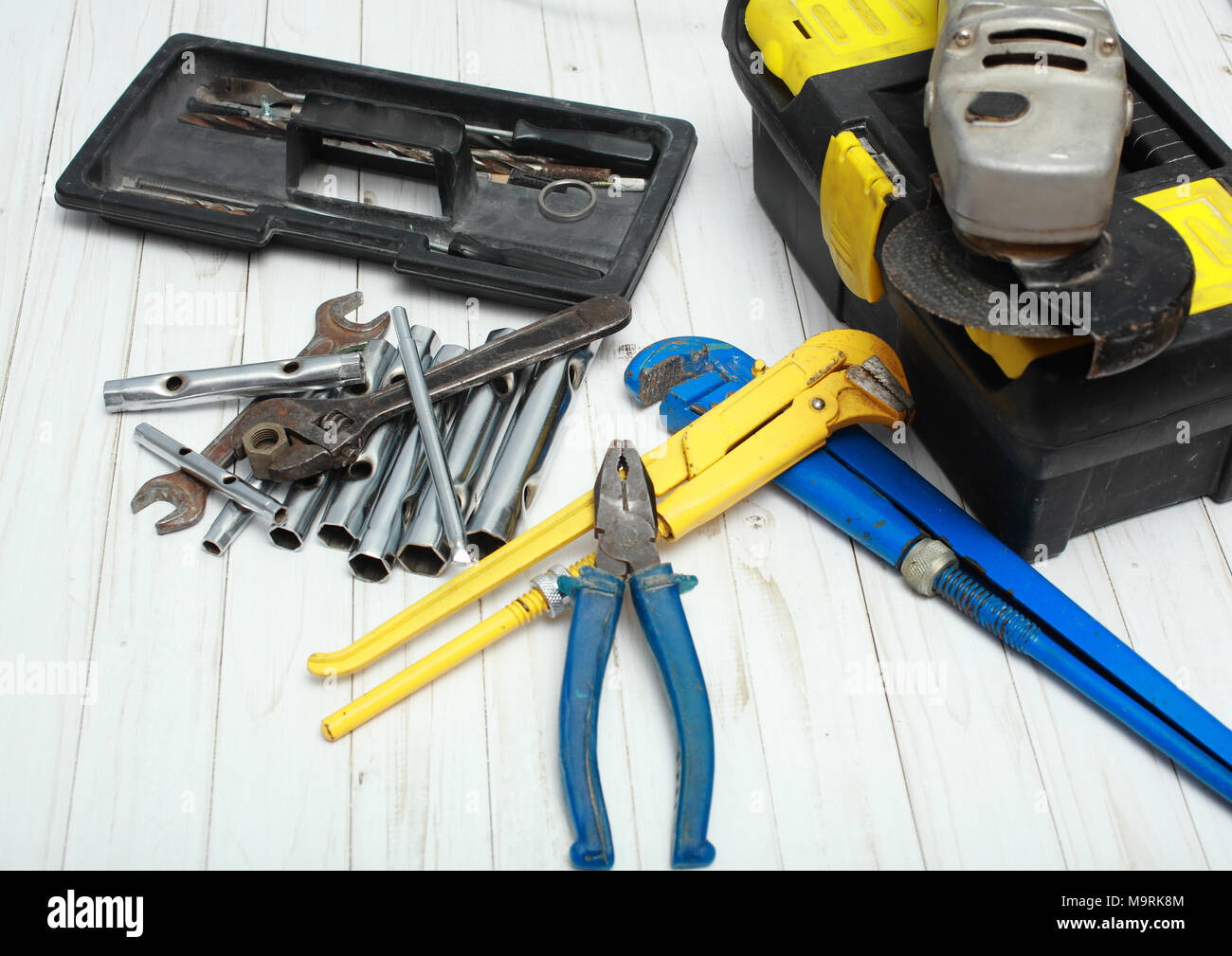 Old tools for repair of the house equipment and bathroom equipment. Stock Photo