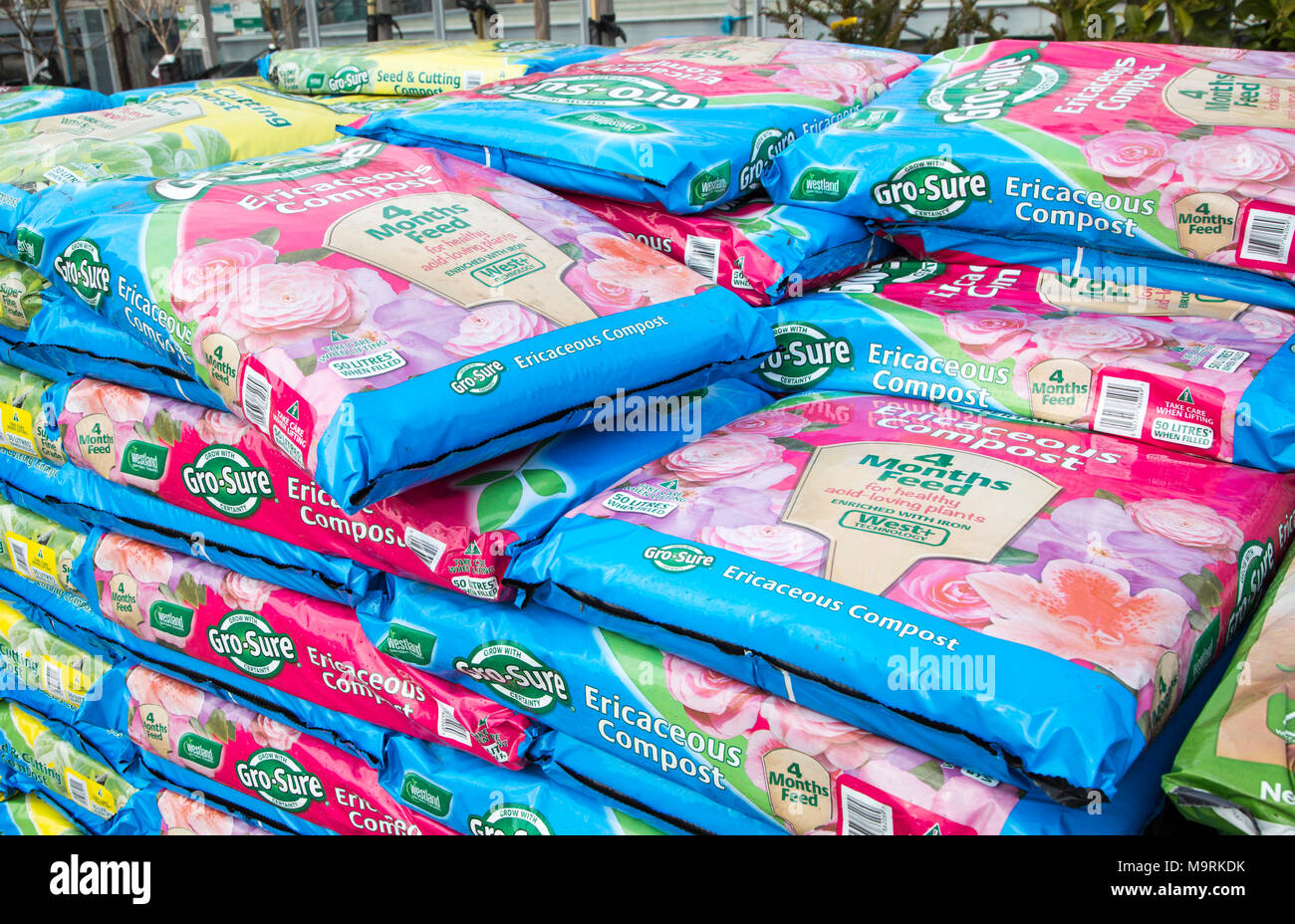 Bags of ericaceous compost on sale Ladybird Nurseries garden centre, Gromford, Suffolk, England