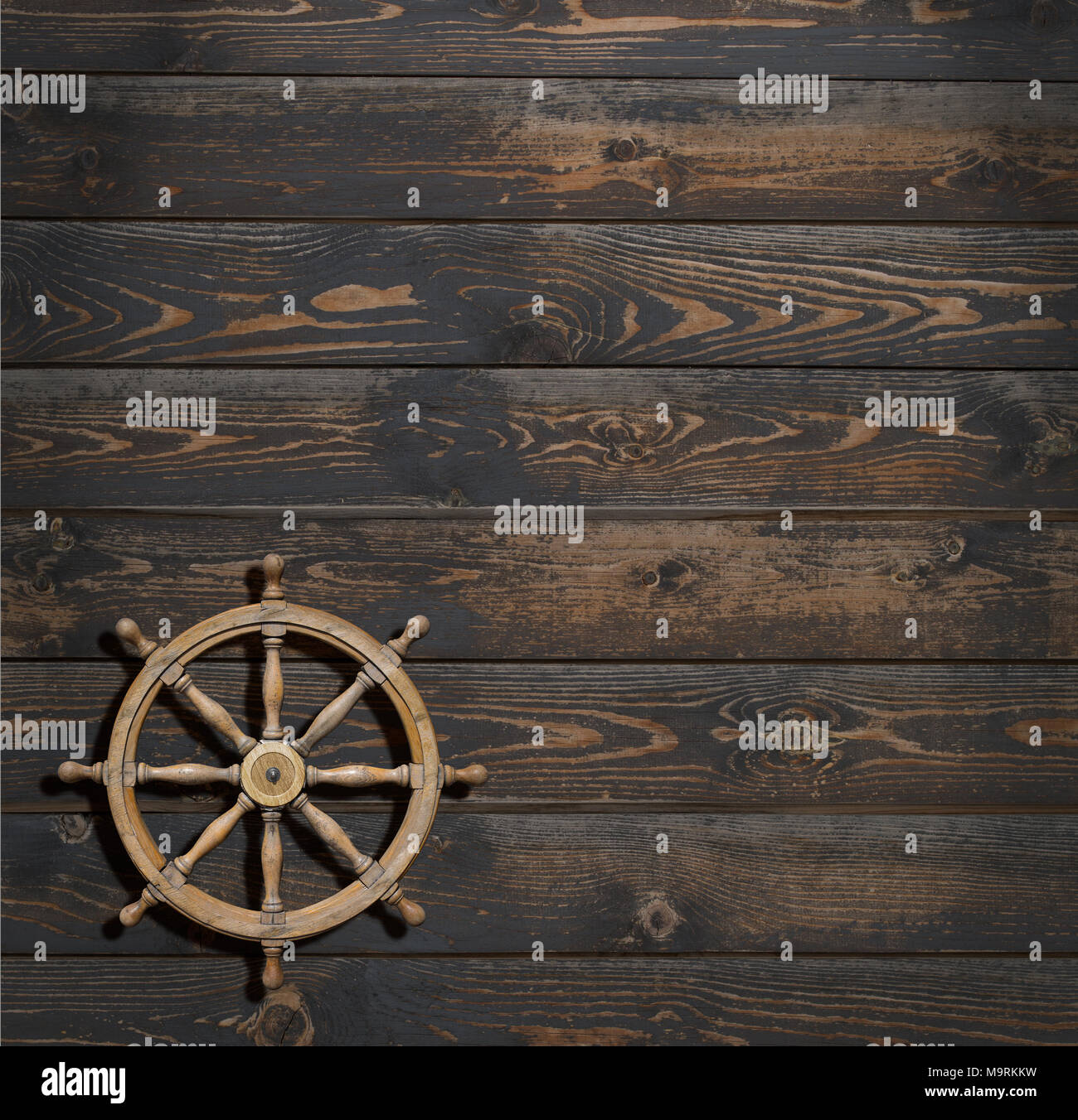 steering wheel on dark wood background Stock Photo
