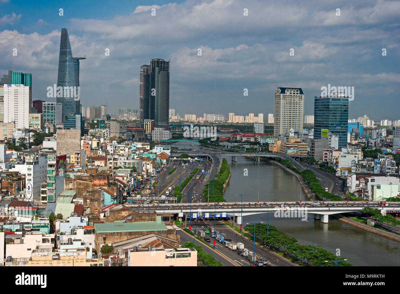 HO CHI MINH CITY, VIETNAM - APRIL 9, 2017: The sun sets over the Ho Chi Minh City skyline that mix the colonial and business district in Vietnam large Stock Photo