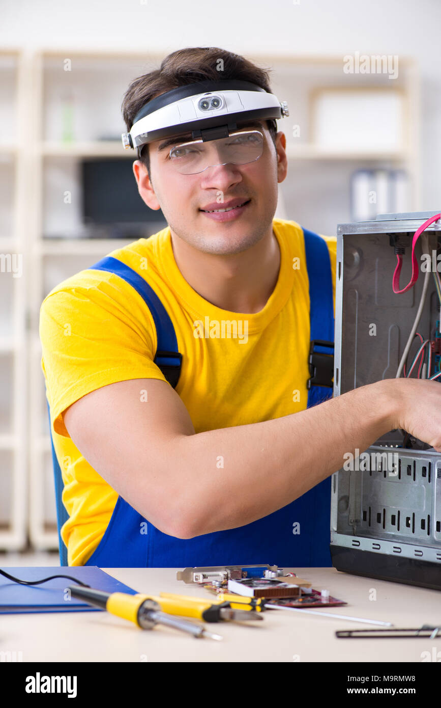 Computer repair technician repairing hardware Stock Photo Alamy