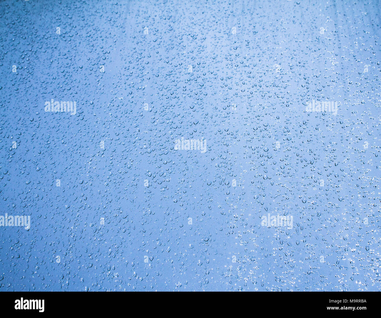 background water drops on blue glass Stock Photo - Alamy