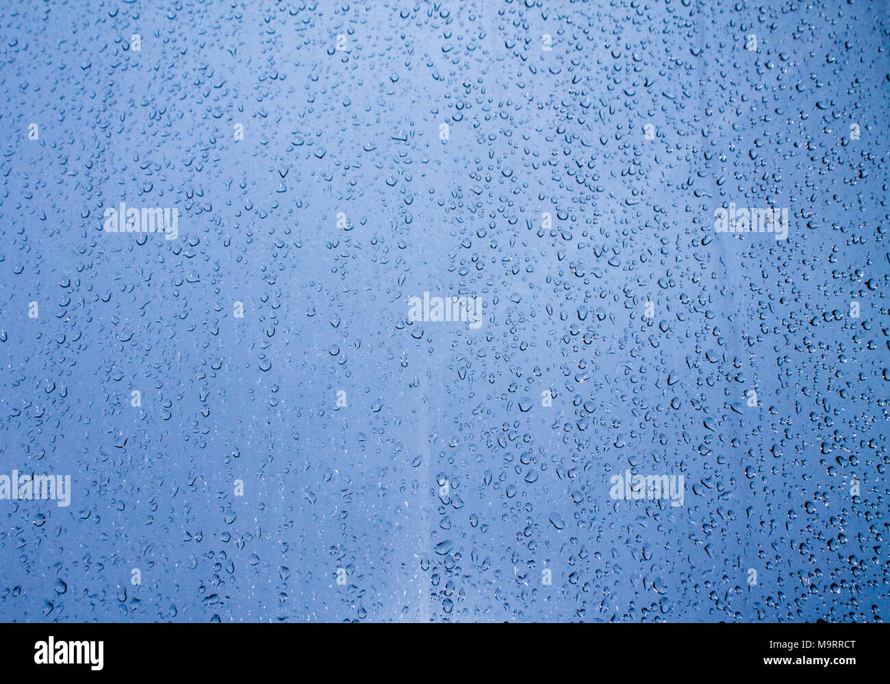 background water drops on blue glass Stock Photo - Alamy