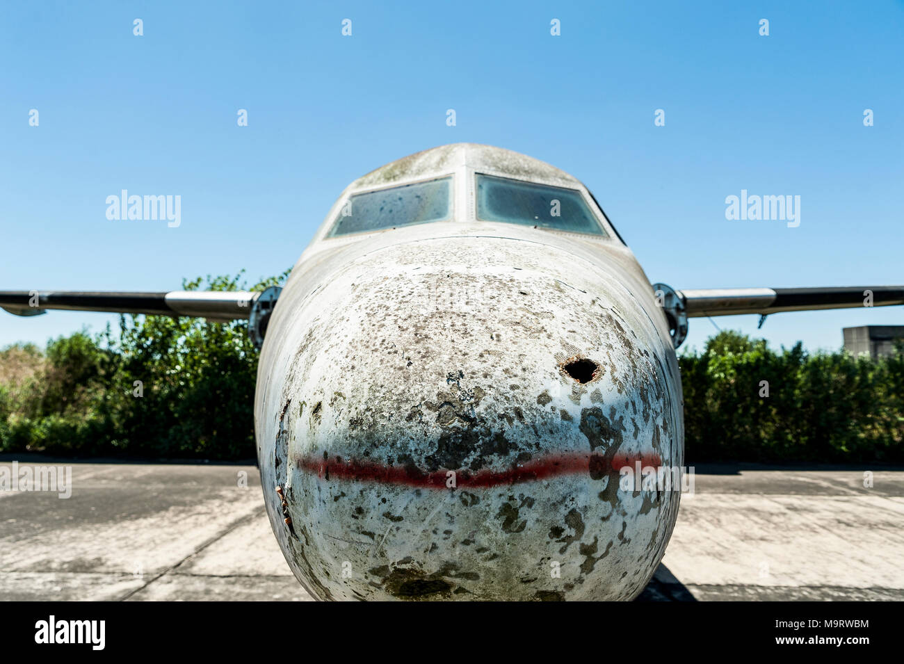 Nature taking over abandoned Fairchild airplanes of CATA Linea Aerea at the Moron Airport in Buenos Aires Stock Photo