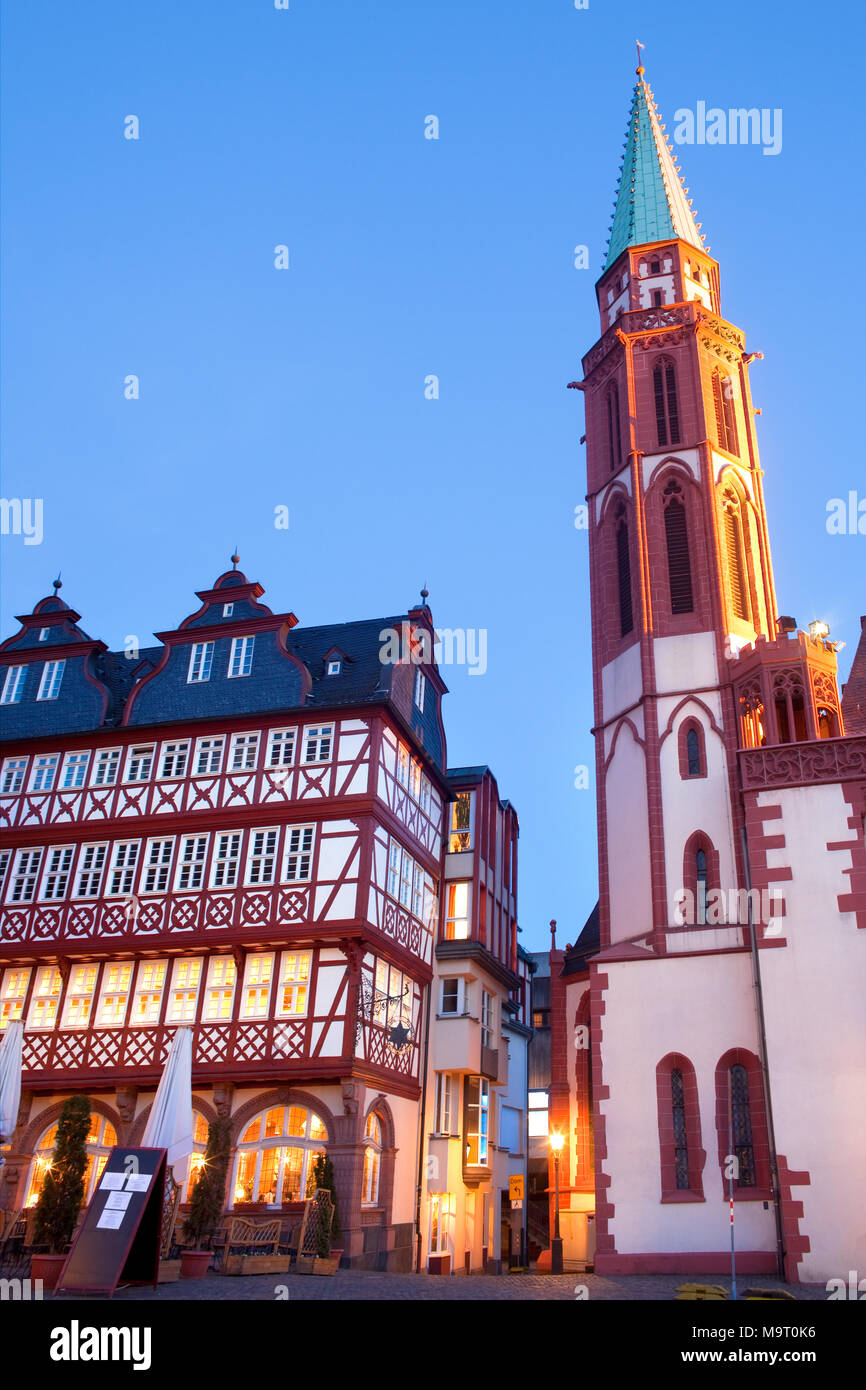Restaurant and Old Nikolai Church at Romerberg square, the old town center, Frankfurt, Hesse, Germany Stock Photo