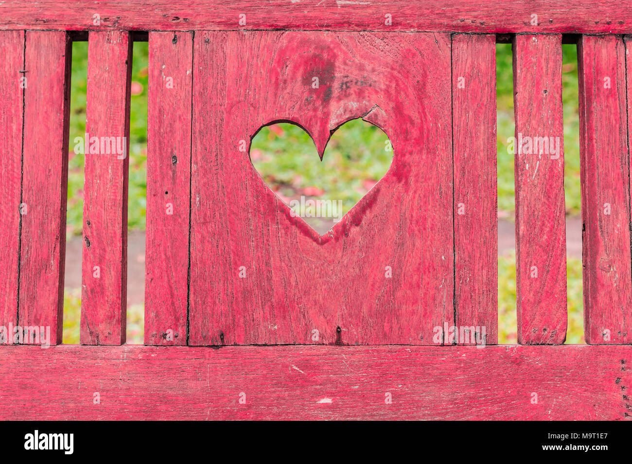 Heart shape in wood background Stock Photo - Alamy