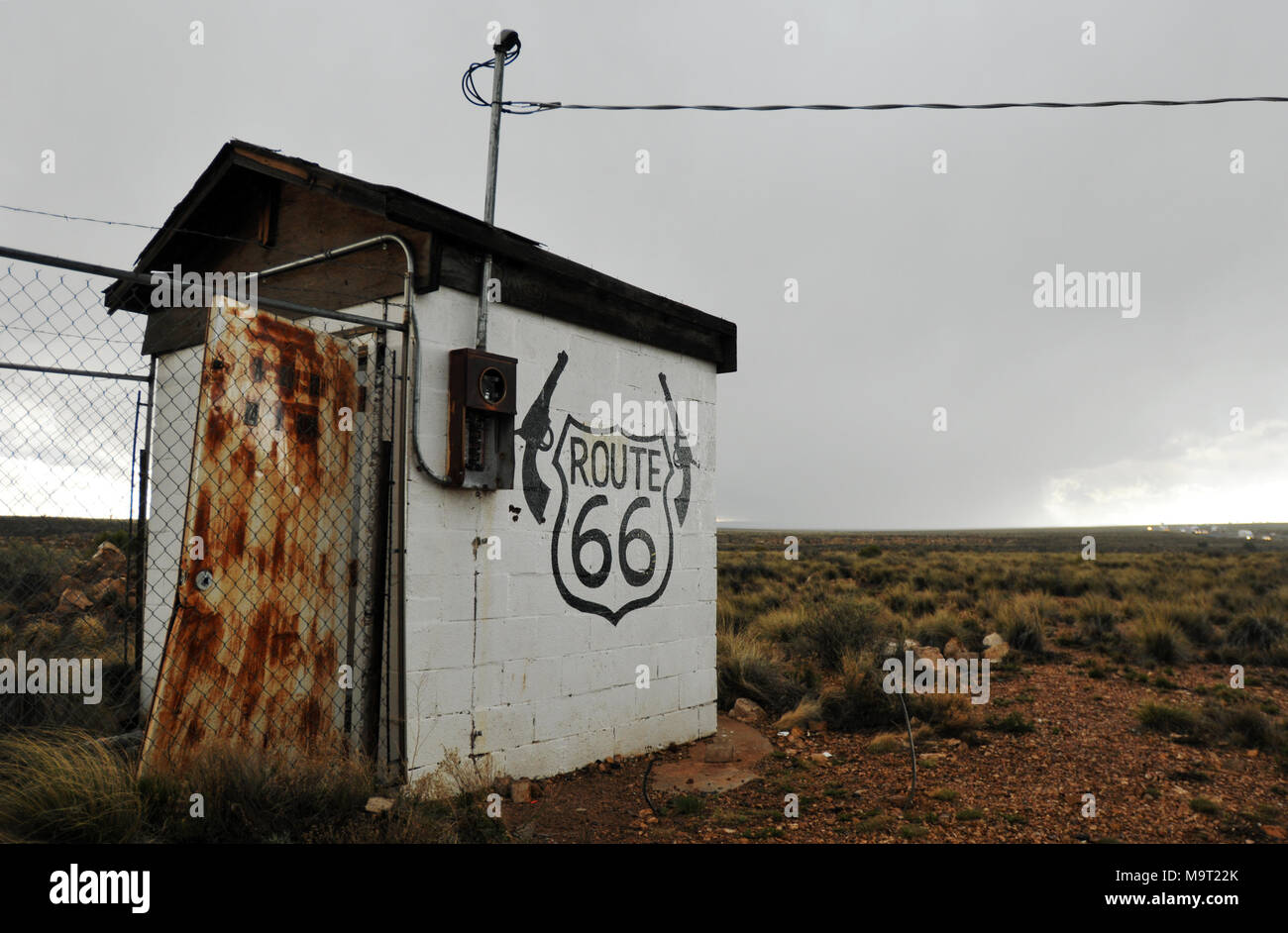 An abandoned shack stands in scrubland at Two Guns, Arizona, once a popular tourist stop along old Route 66. Interstate 40 passes the site today. Stock Photo
