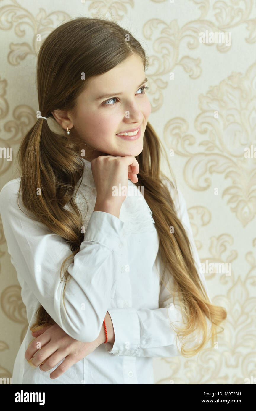 Portrait of happy little girl posing at home Stock Photo - Alamy