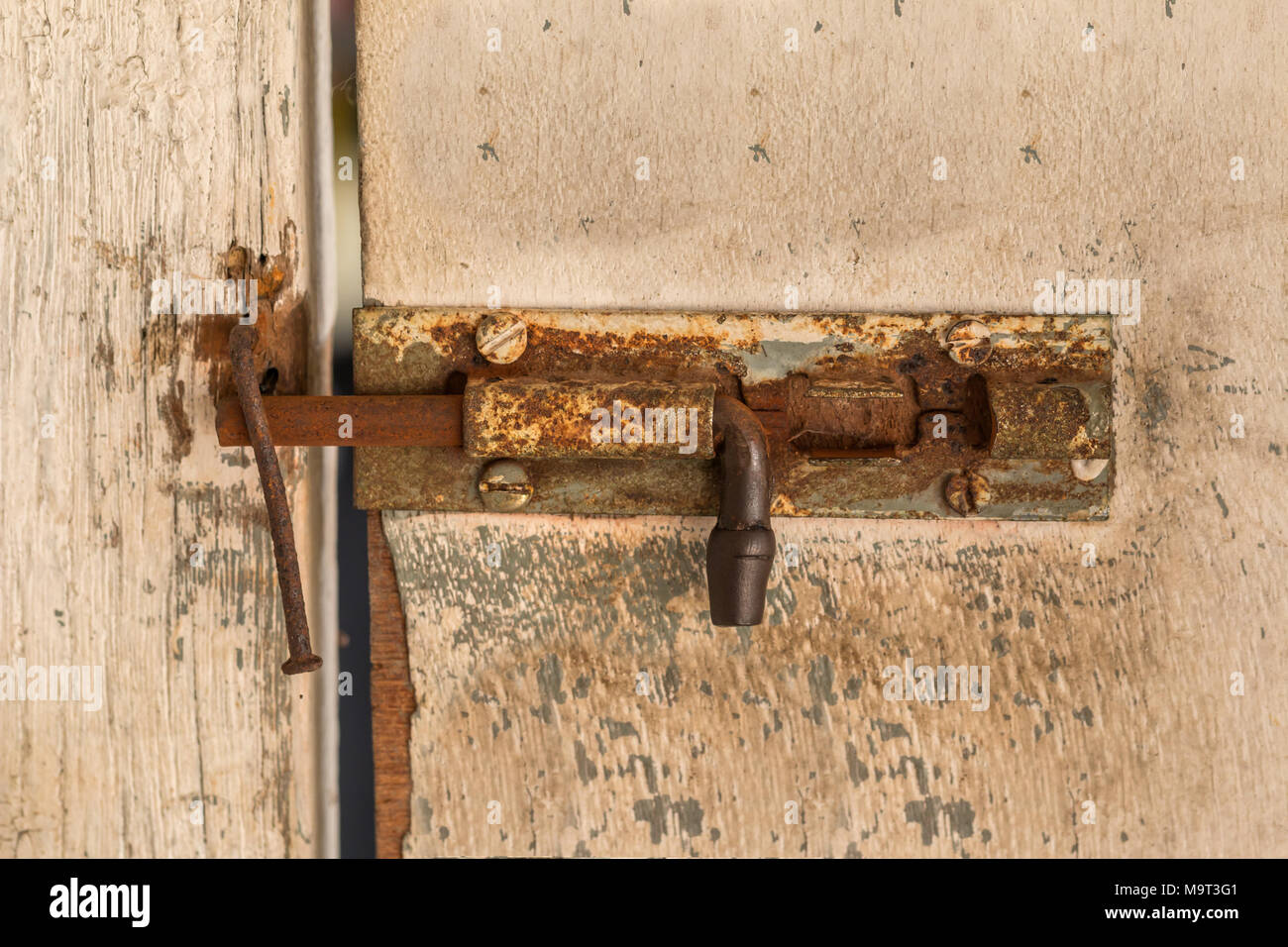 old wooden door with rusty lock Stock Photo - Alamy