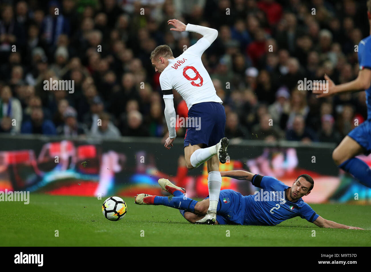 Jamie Vardy of England is tackled by Mattia De Sciglio of Italy. Football International friendly, England v Italy at Wembley Stadium in London on Tues Stock Photo