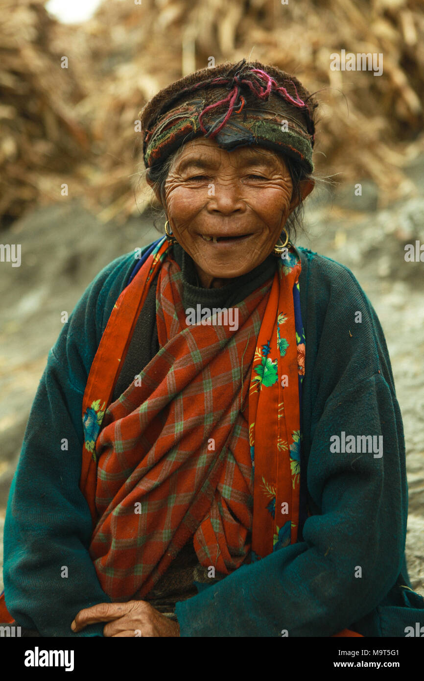 Old woman smile. The Tamangs are a group of ethnic minority people mainly live in Nepal. Their population is estimated at around 1.5 million in 2016. Stock Photo