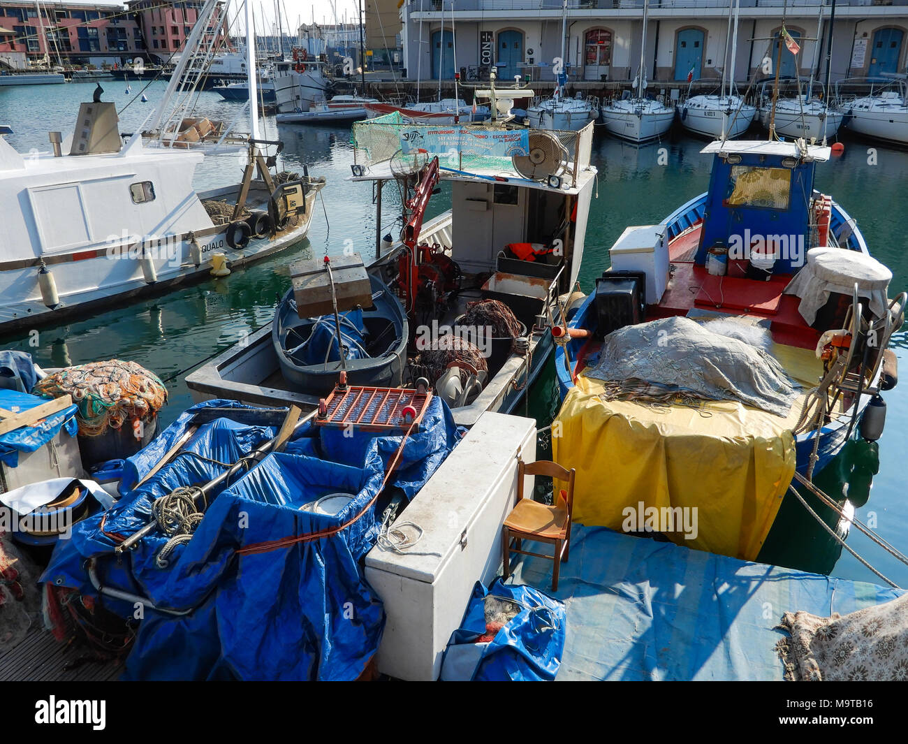 Fishing boats moored in the port. Stock Photo