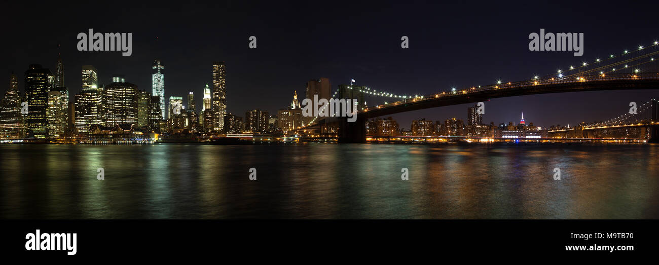 Panorama of Brooklyn Bridge in New York City at night Stock Photo - Alamy