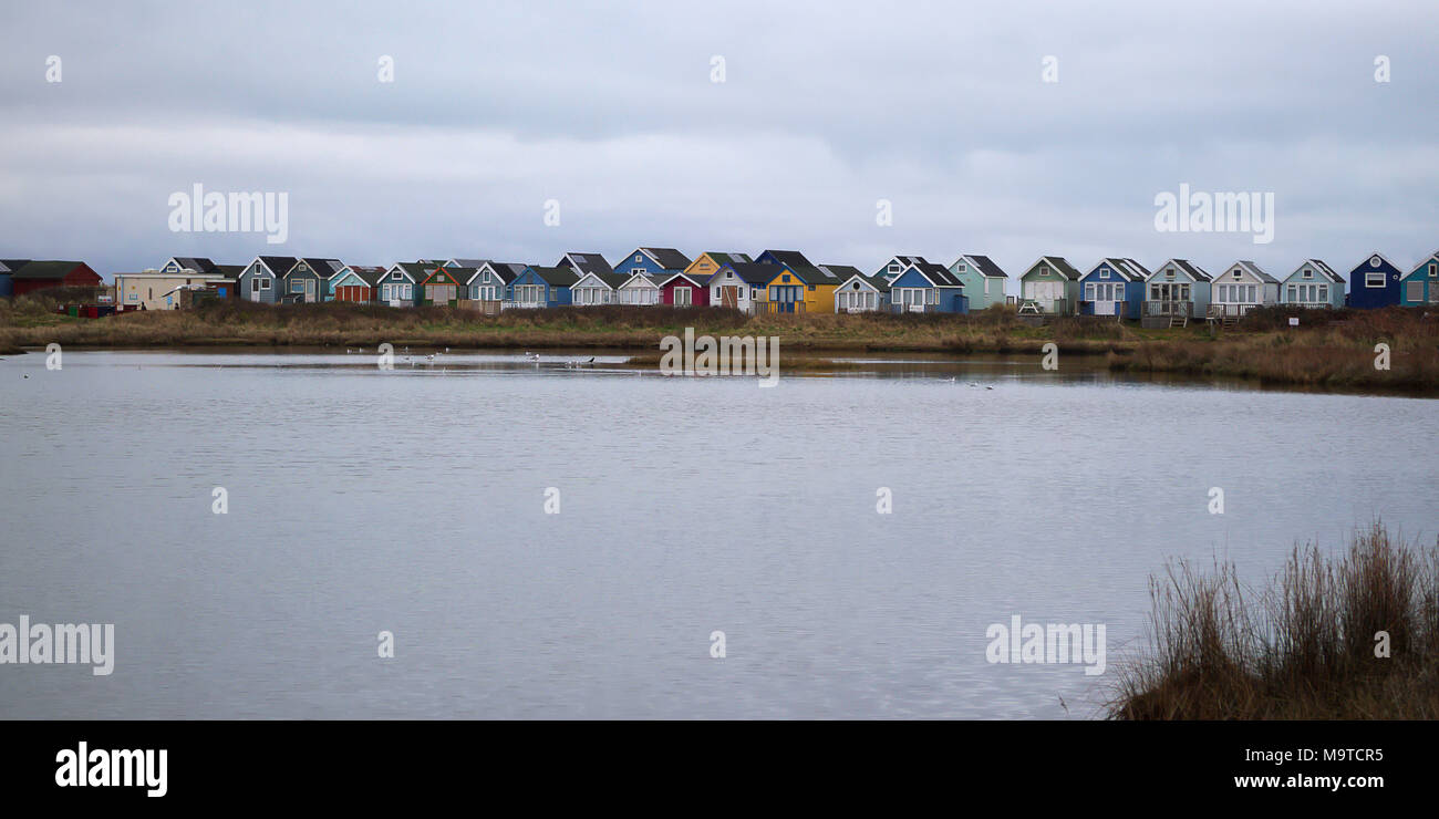 Britains most expensive beach huts at Mudeford Spit in Christchurch, Dorset with no running water, mains electricity or toilet Stock Photo