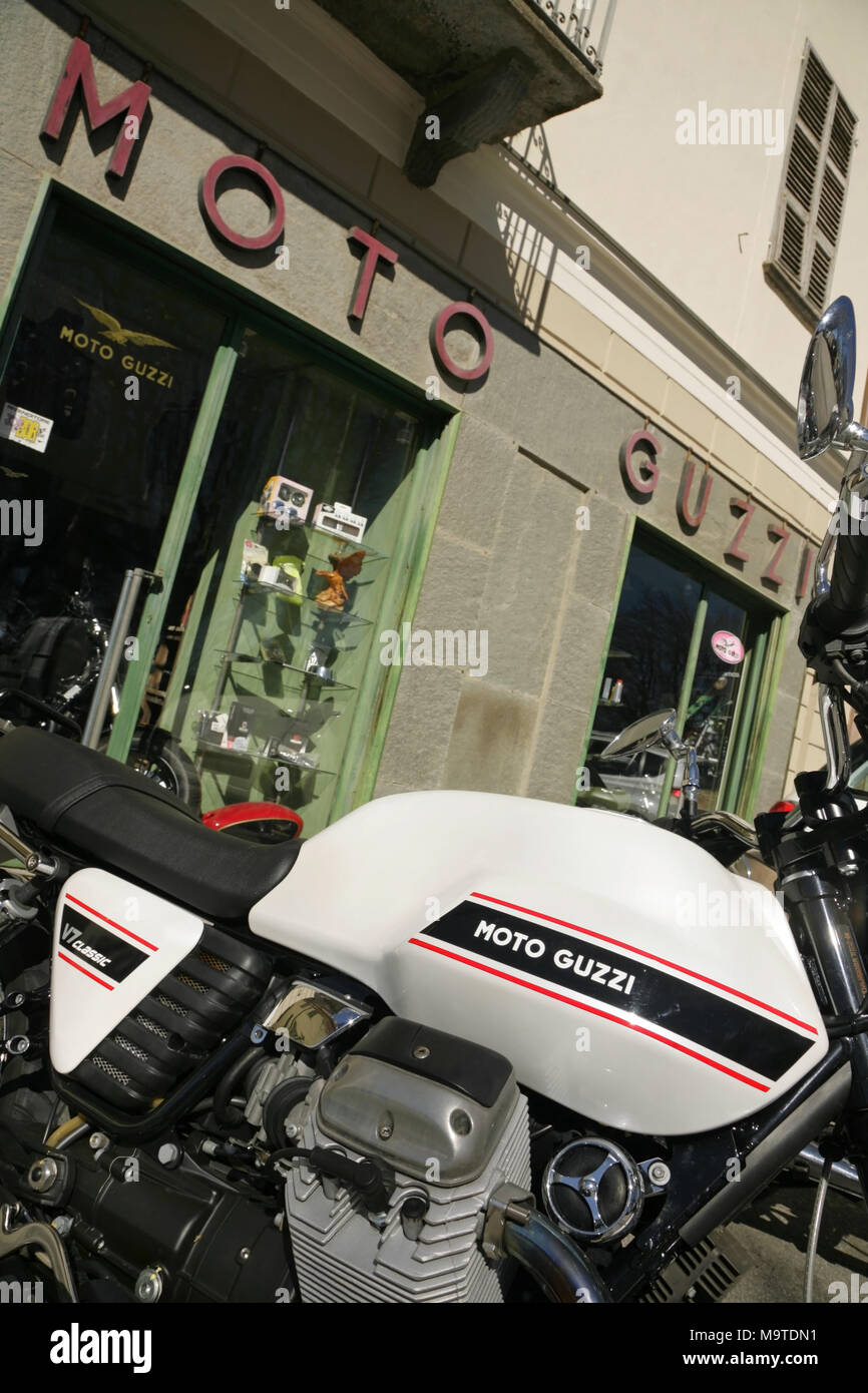 Moto Guzzi V7 Classic motorcycle outside dealership in Cuneo, Italy. Stock Photo
