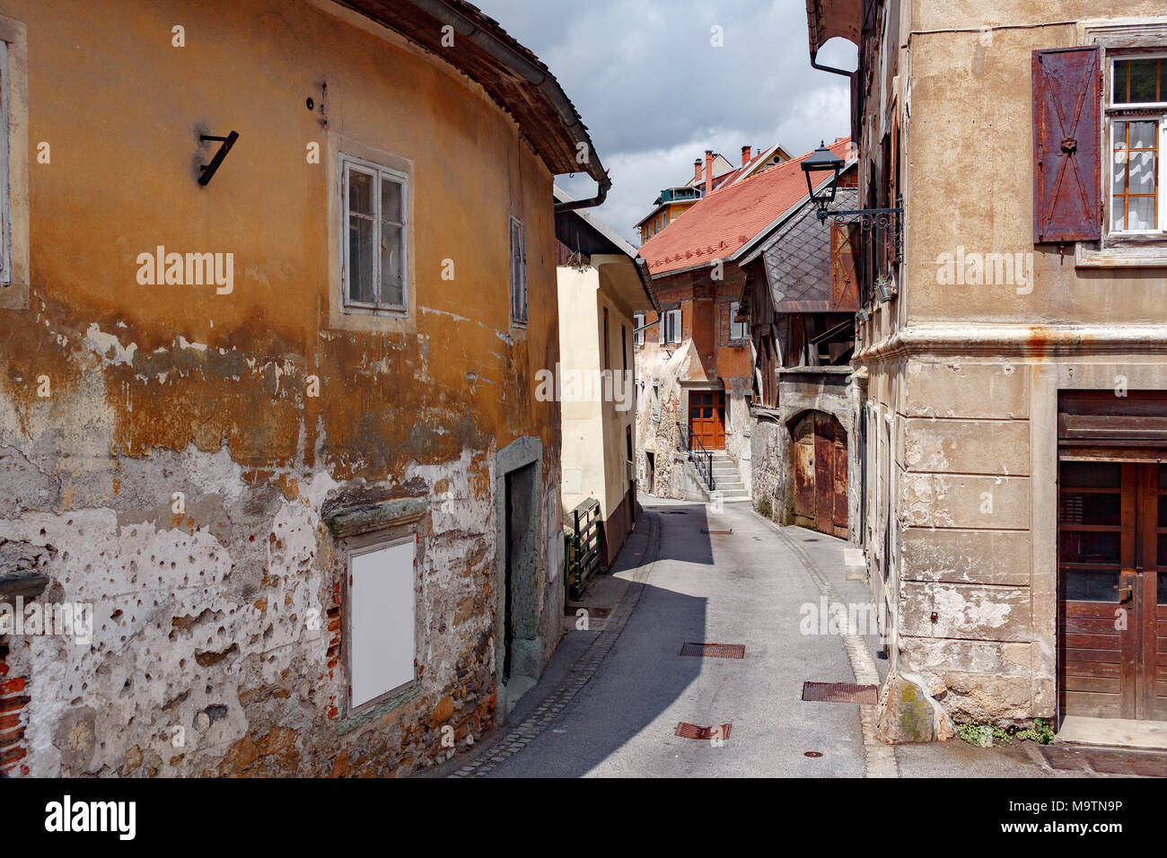 Street A small town in the mountains of Slovenia, Europe. Shabby old ...