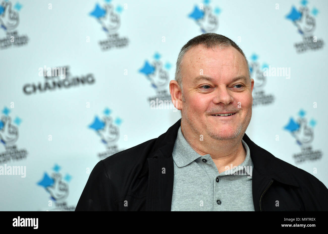 Father of three and life-long Leyton Orient fan from Wickford, Paul Long, celebrates after his Lucky Dip ticket matched all six numbers to scoop the £9,339,858 Lotto Jackpot on Saturday 24 March, at the Orsett Hall Hotel, in Orsett, Essex. Stock Photo
