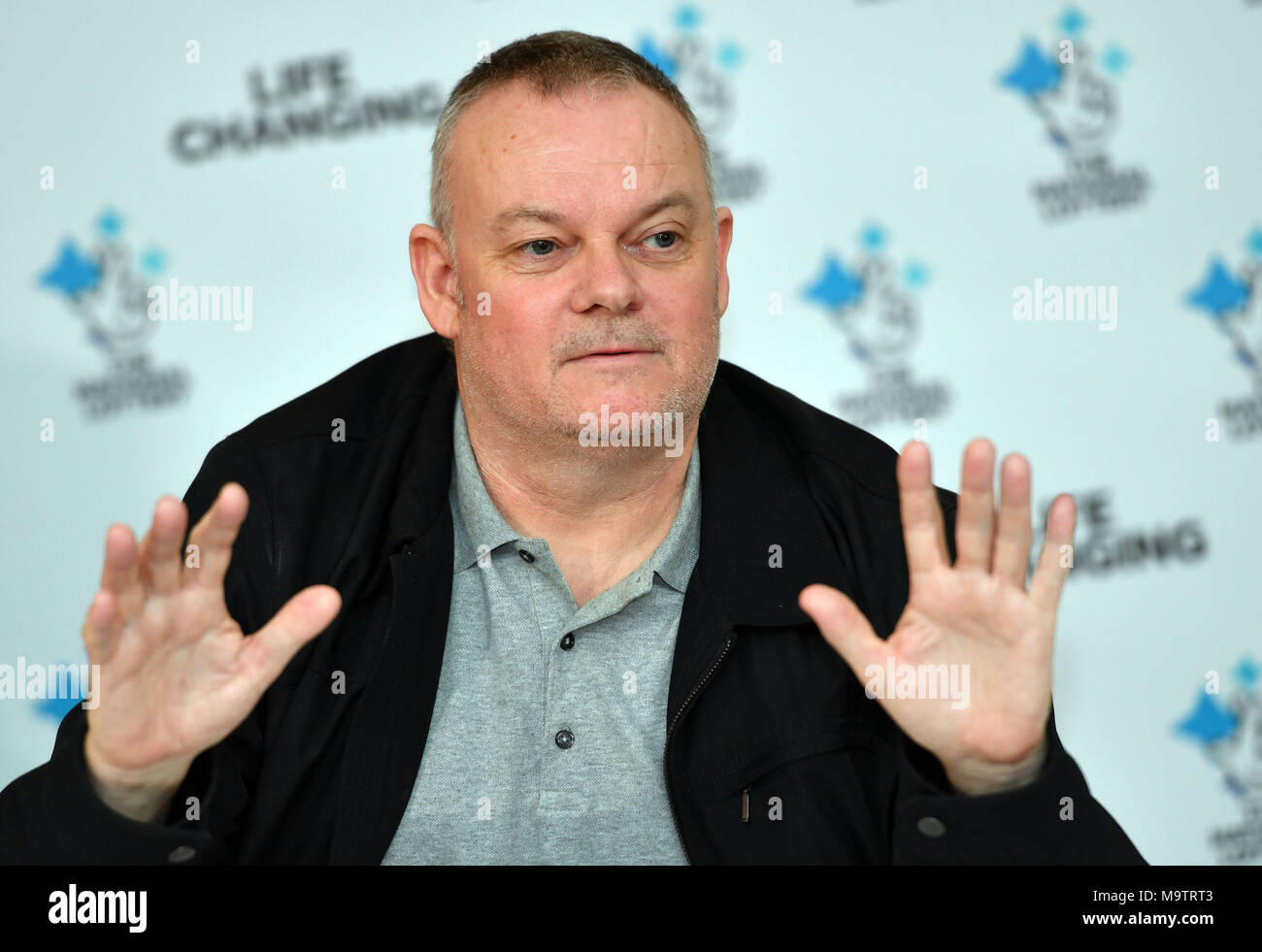 Father of three and life-long Leyton Orient fan from Wickford, Paul Long, celebrates after his Lucky Dip ticket matched all six numbers to scoop the £9,339,858 Lotto Jackpot on Saturday 24 March, at the Orsett Hall Hotel, in Orsett, Essex. Stock Photo