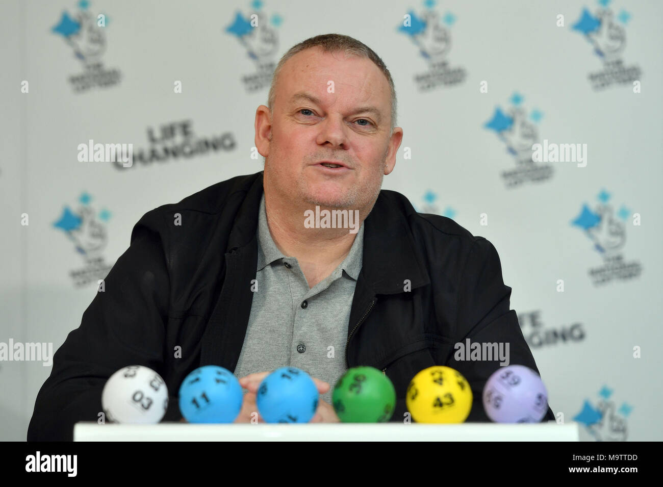 Father of three and life-long Leyton Orient fan from Wickford, Paul Long, celebrates after his Lucky Dip ticket matched all six numbers to scoop the £9,339,858 Lotto Jackpot on Saturday 24 March, at the Orsett Hall Hotel, in Orsett, Essex. Stock Photo