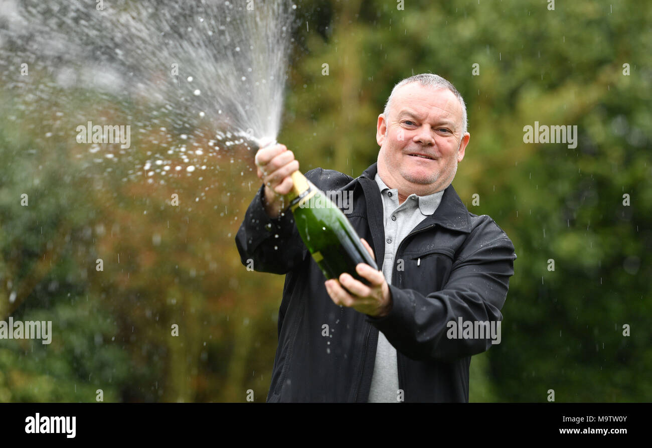 Father of three and life-long Leyton Orient fan from Wickford, Paul Long, celebrates after his Lucky Dip ticket matched all six numbers to scoop the £9,339,858 Lotto Jackpot on Saturday 24 March, at the Orsett Hall Hotel, in Orsett, Essex. Stock Photo