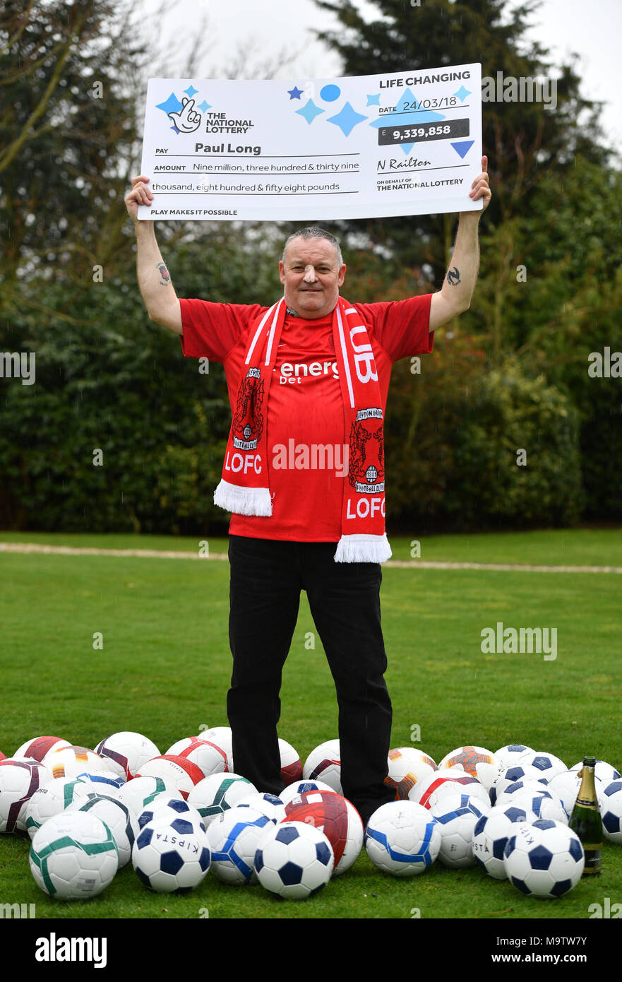 Father of three and life-long Leyton Orient fan from Wickford, Paul Long, celebrates after his Lucky Dip ticket matched all six numbers to scoop the £9,339,858 Lotto Jackpot on Saturday 24 March, at the Orsett Hall Hotel, in Orsett, Essex. Stock Photo
