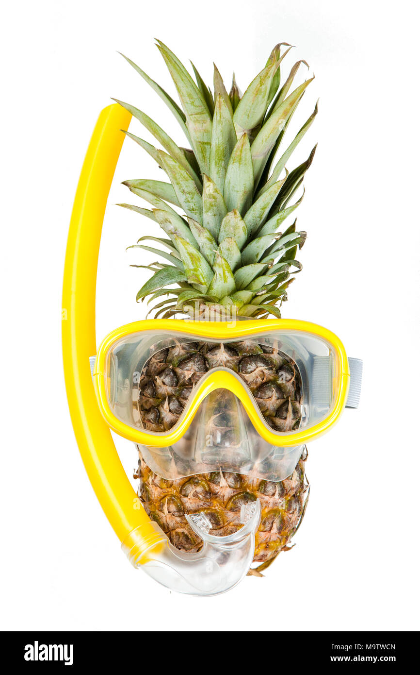 Pineapple in a snorkeling mask Stock Photo