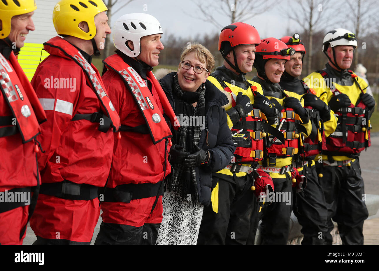 Community Safety Minister Annabelle Ewing chats with firemen from Falkirk and Bathgate stations after she was given a live water rescue demonstration at Falkirk's Helix Park, as she helps mark five years of the Scottish Fire and Rescue Service. Stock Photo