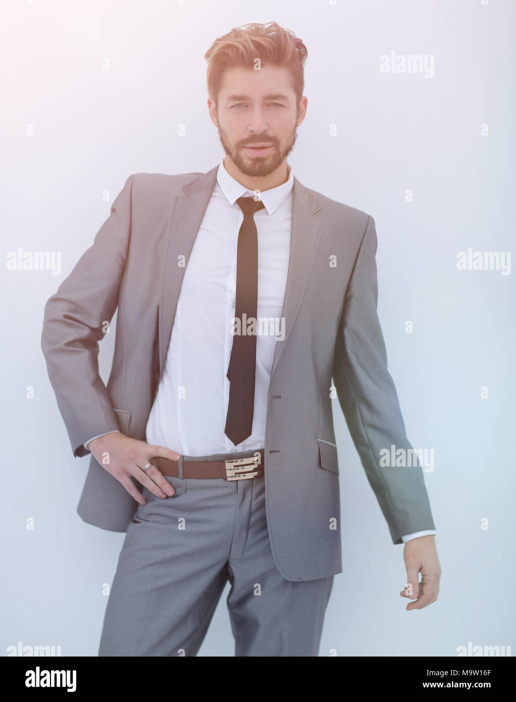 Serious Businessman With Hands On Hips Isolated Background Stock Photo