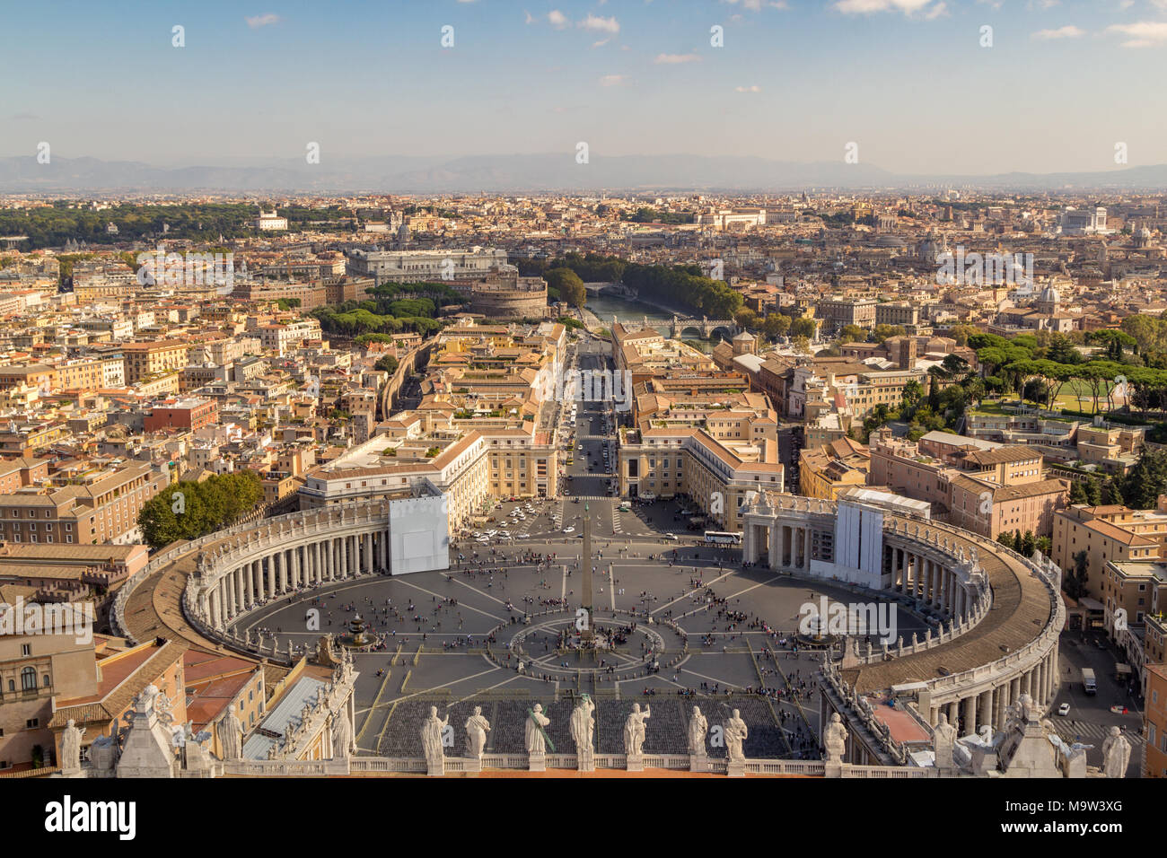 The impressive skyline of the city Rome from St. Peter's Basilica with a blue sky in Italy. Stock Photo