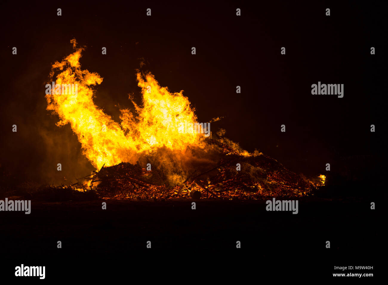 Dangerous high flames from the bonfire in Floradorp Amsterdam North in the Netherlands. Stock Photo