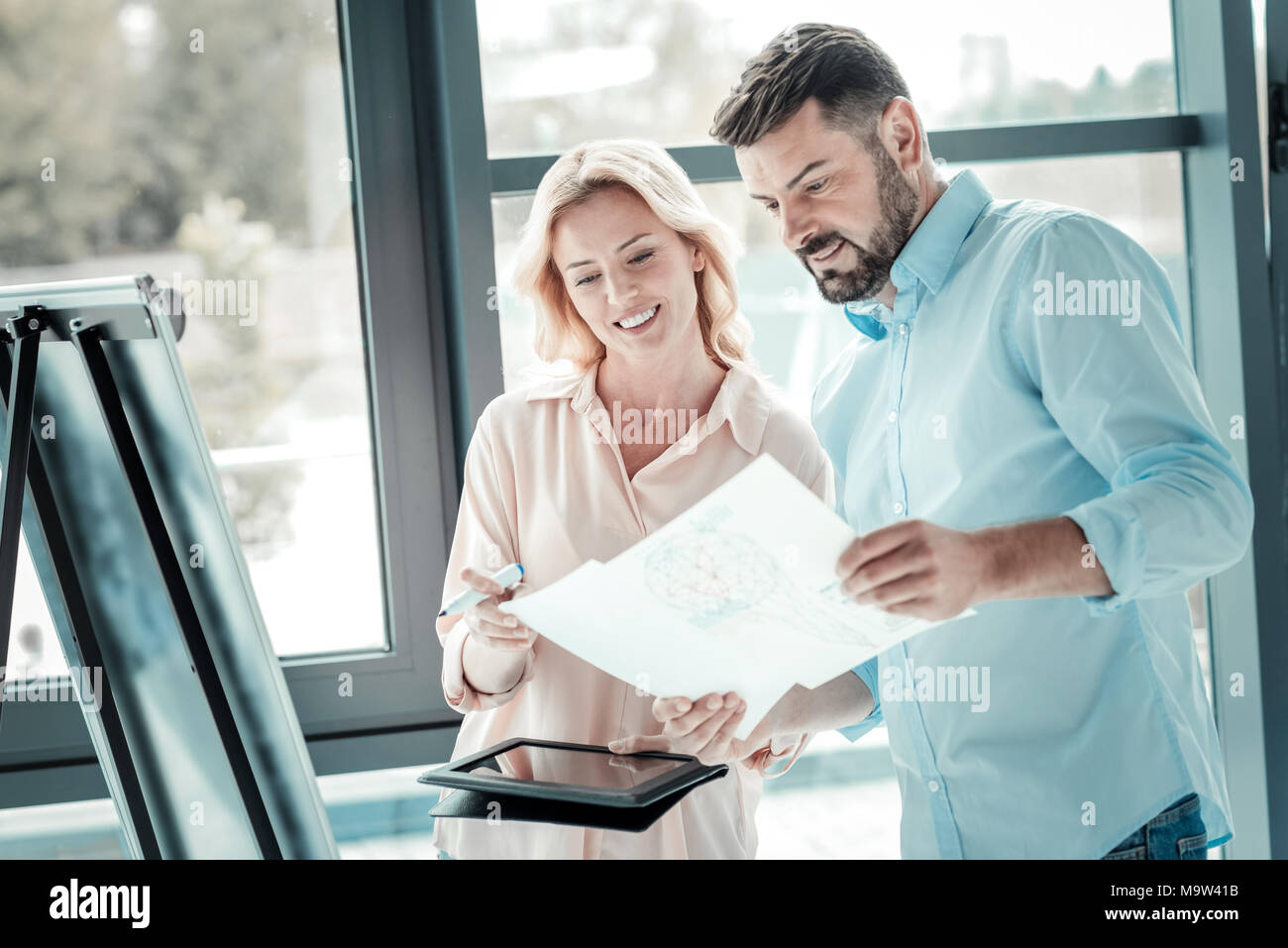Businessman demonstrating modern gadget hi-res stock photography and ...