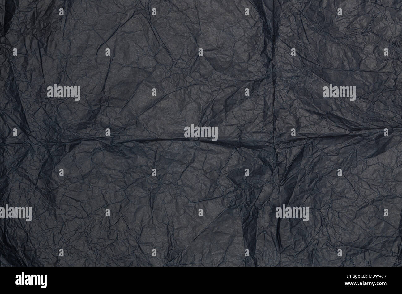 Black crumpled paper as a structure Stock Photo - Alamy